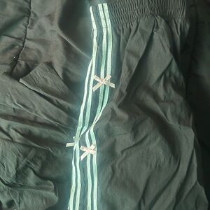 Black Pants with White Stripes and Bows